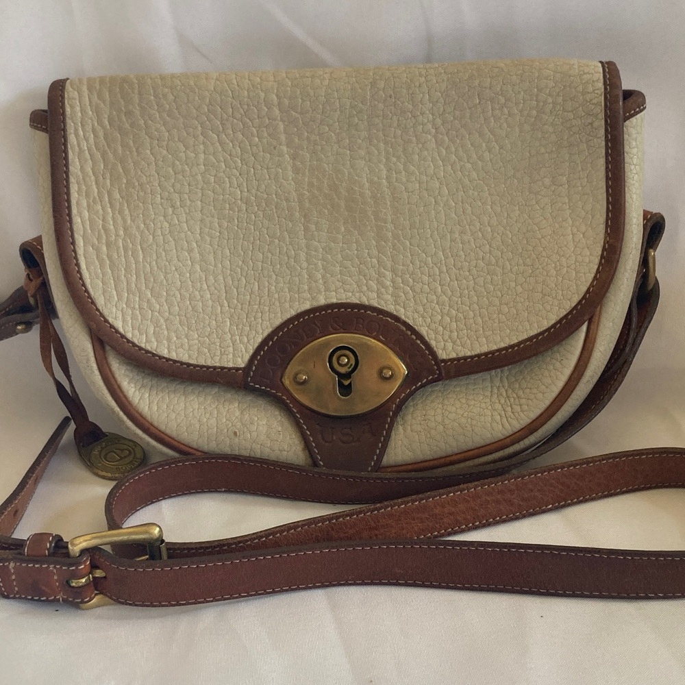 Vintage Dooney & Bourke bone and brown Trooper Saddle Bag